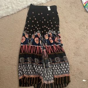 Brand new Long skirt with buttons and open slit in the front